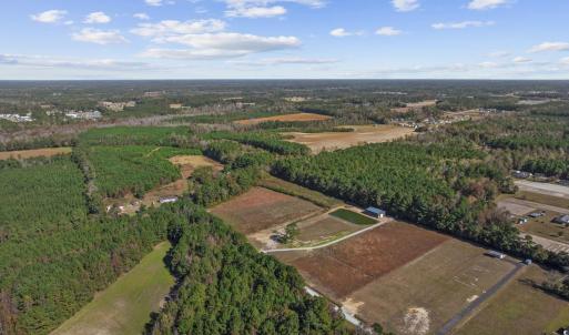 Aerial overview of property's location with a heav