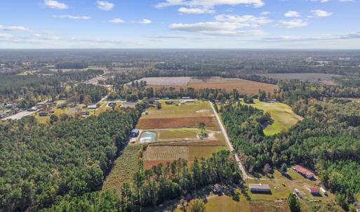 View of property location with a forest