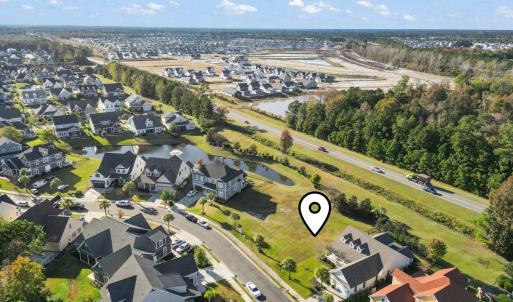 Aerial view of property and surrounding area featu