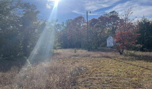 View of yard featuring a storage shed