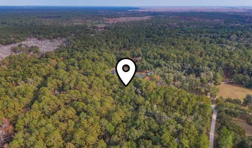 Aerial view of property and surrounding area featu