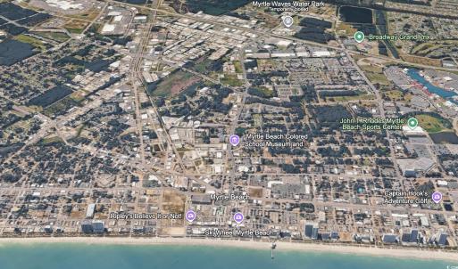 View of property location with a nearby body of wa