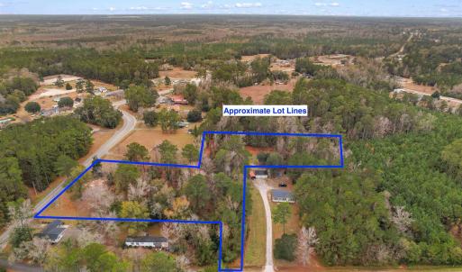 Aerial view of property and surrounding area featu