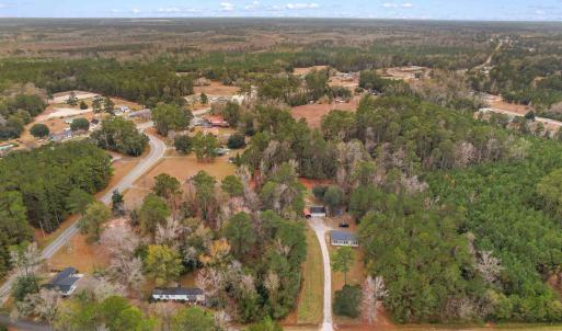 Aerial overview of property's location with a fore