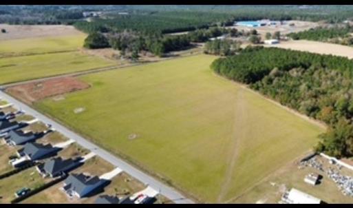 Aerial view of sparsely populated area with abunda