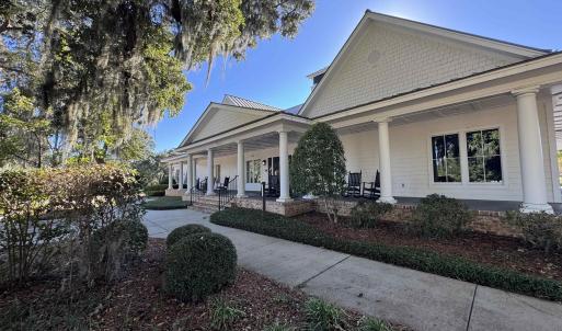 View of property exterior featuring covered porch