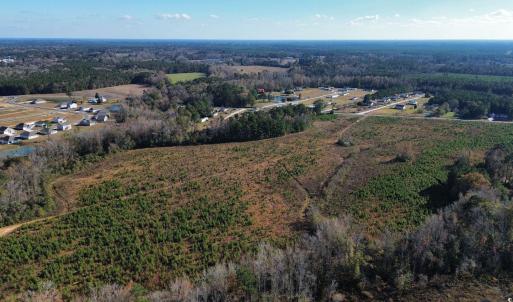 Aerial overview of property's location with a fore