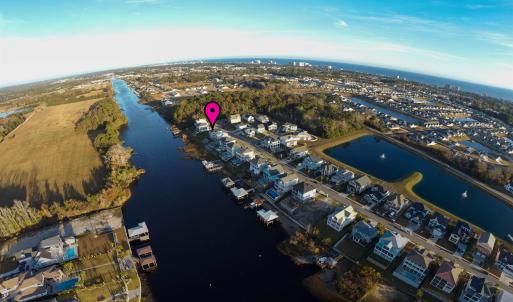 Aerial view of property and surrounding area featu