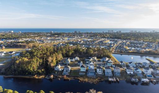 Aerial view of residential area with a nearby body