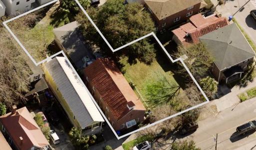 Aerial view of residential area featuring property