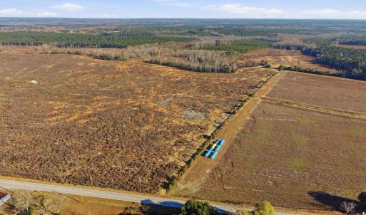 View of rural area featuring large plots for crops