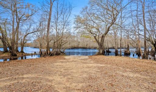 View of yard with a water view