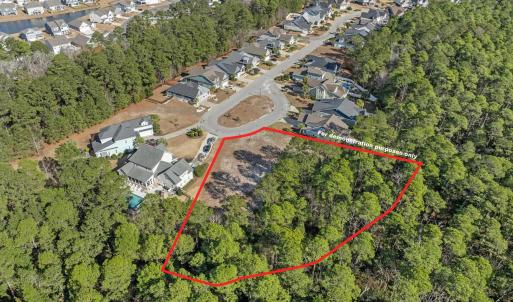 Aerial view of residential area with property parc