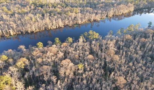 Aerial view of property and surrounding area with