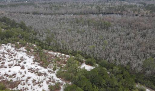 Aerial view of property's location featuring a for