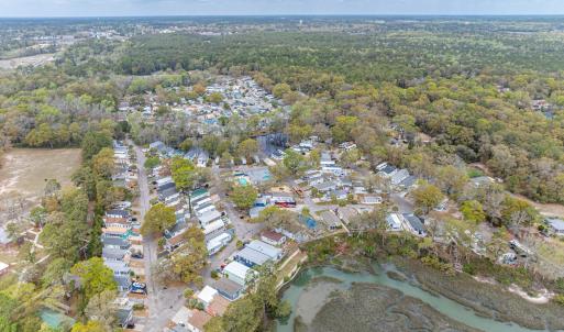 Aerial view of property and surrounding area with