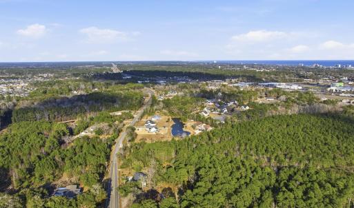 Aerial view of property's location featuring a nea