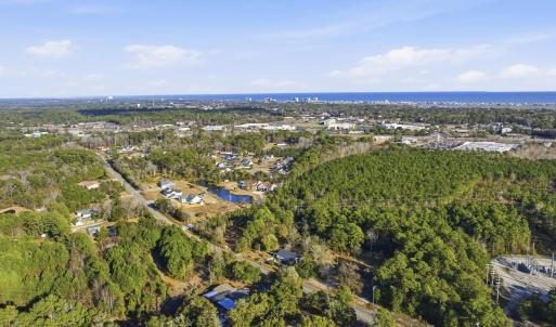 Aerial view of property and surrounding area featu