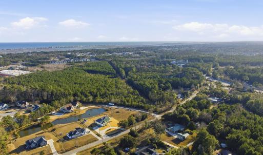 View of property location with a nearby body of wa