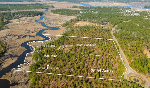 Aerial view of property and surrounding area with