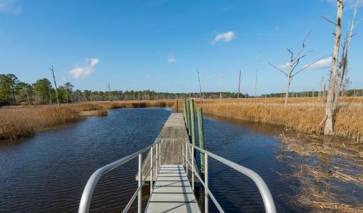 Dock featuring a water view