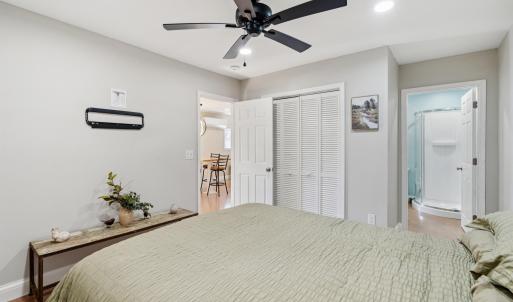 Bedroom with recessed lighting, a ceiling fan, a c