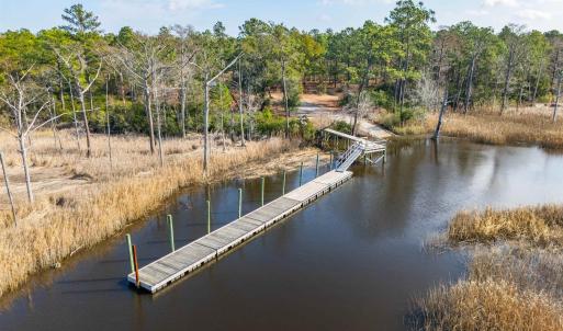 Dock featuring a water view