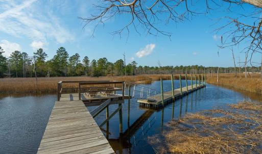 Dock featuring a water view