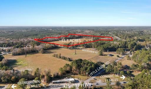 Aerial view of property and surrounding area featu