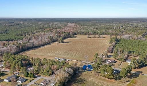 Aerial view of property and surrounding area featu