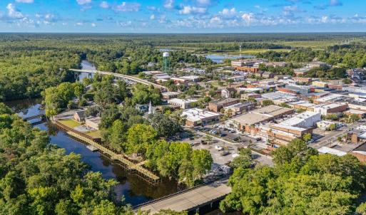 Aerial view of a notable bridge and a large body o