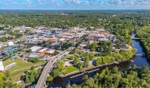 Aerial view of property's location with a heavily