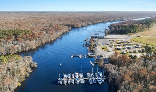 Drone / aerial view of a heavily wooded area and a