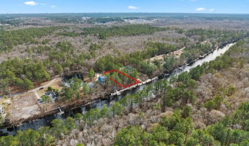 Aerial view of property's location featuring prope