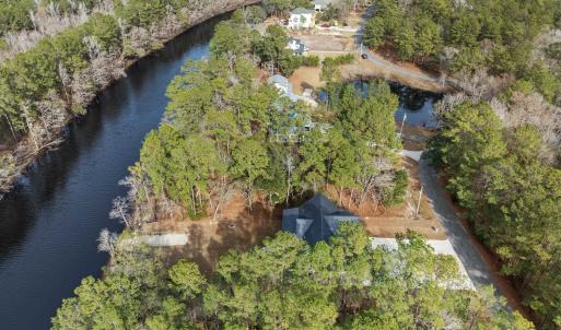 Aerial view of property and surrounding area featu