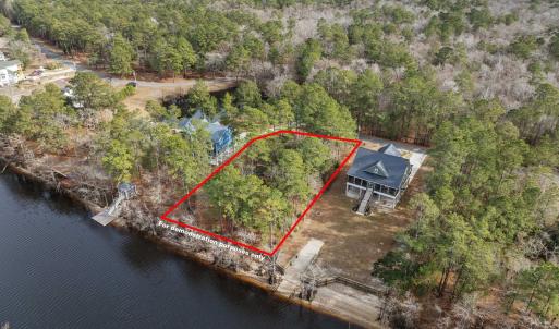 Aerial view of property and surrounding area with