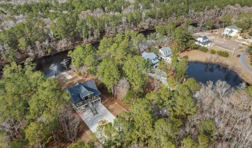 Aerial view of a large body of water and a forest