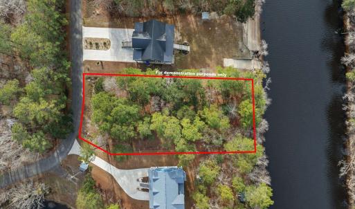 Aerial view of property and surrounding area with