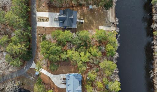 Aerial view of property and surrounding area featu
