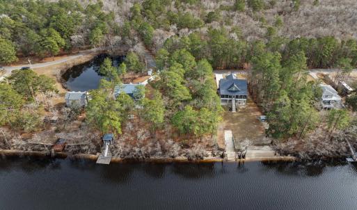 Aerial view of property's location with a large bo