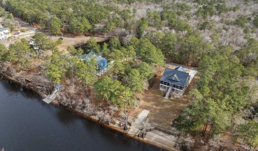 Aerial view of property and surrounding area with