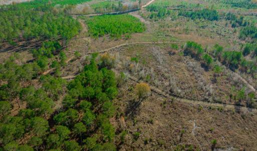 Aerial view of property and surrounding area featu
