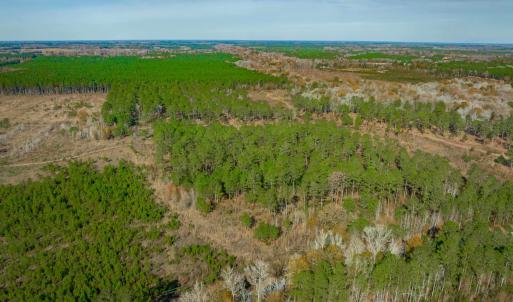 Aerial view of property and surrounding area featu