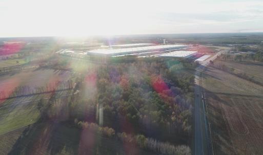 Aerial view of sparsely populated area with an ind