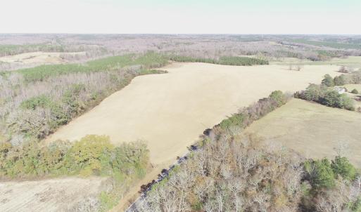 Aerial view of sparsely populated area with a heav