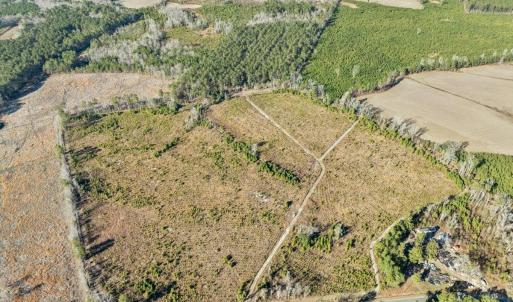 Aerial view of property and surrounding area featu