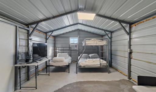 Garage featuring metal wall