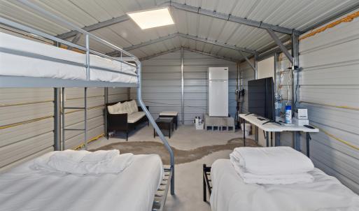 Garage featuring metal wall