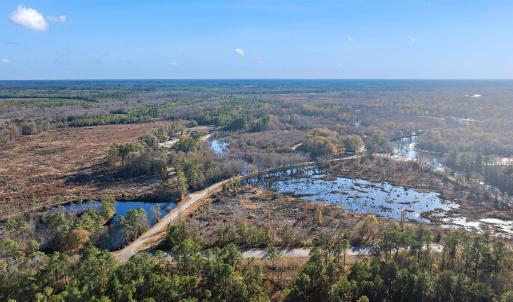 Aerial view of property and surrounding area with