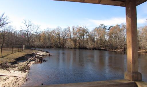 View of the river from the gazebo with fencing, ga